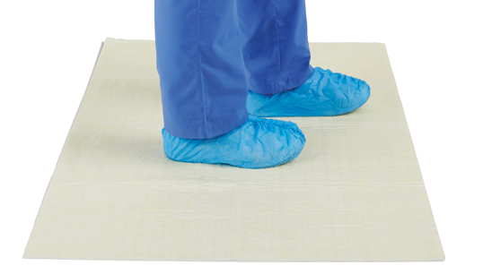 Absorbent pad for clinical settings